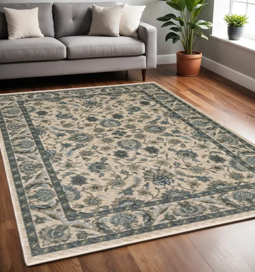 Beige And Blue Oriental Area Rug With Fringe Photo 1