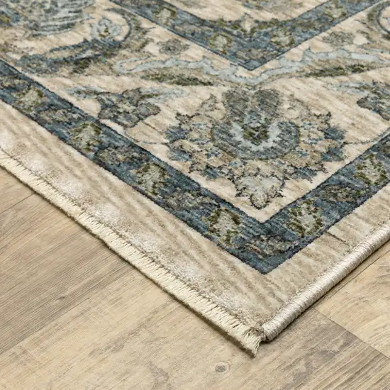 Beige And Blue Oriental Area Rug With Fringe Photo 5