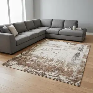 Photo of Beige And Brown Abstract Area Rug