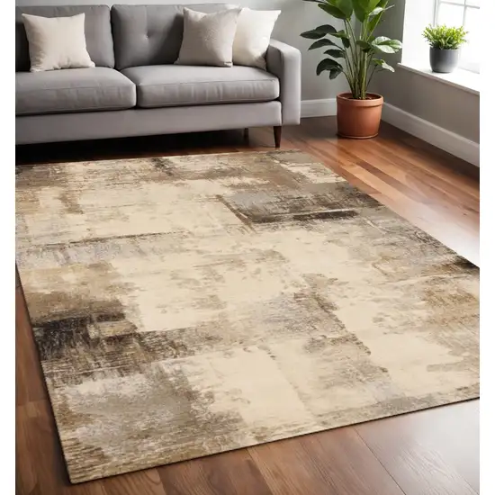 Beige And Brown Abstract Area Rug Photo 1
