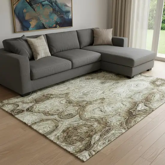 Beige And Brown Abstract Washable Area Rug With UV Protection Photo 1