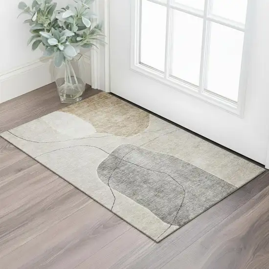 Beige And Brown Abstract Washable Area Rug With UV Protection Photo 1