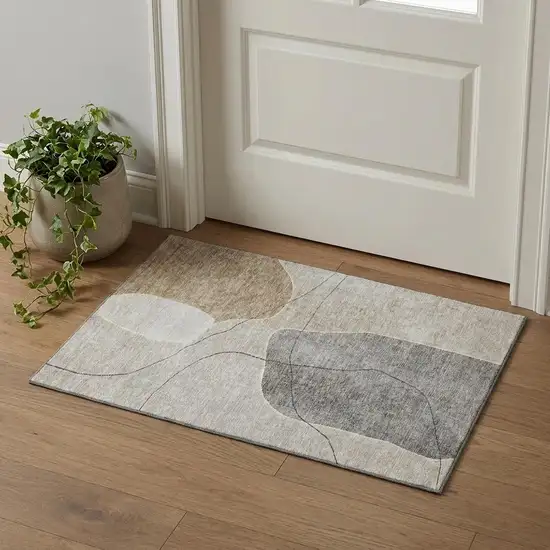 Beige And Brown Abstract Washable Area Rug With UV Protection Photo 1