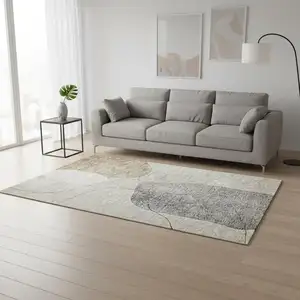 Photo of Beige And Brown Abstract Washable Area Rug With UV Protection