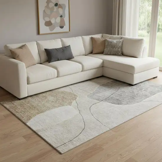 Beige And Brown Abstract Washable Area Rug With UV Protection Photo 1