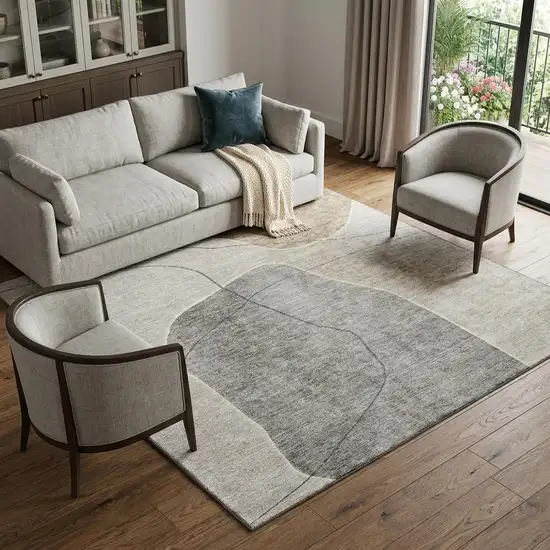 Beige And Brown Abstract Washable Area Rug With UV Protection Photo 1