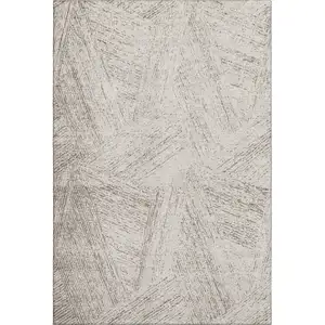 Photo of Beige And Brown Abstract Washable Area Rug With UV Protection