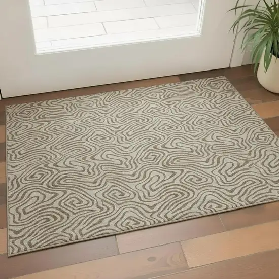 Beige And Brown Abstract Washable Area Rug With UV Protection Photo 2