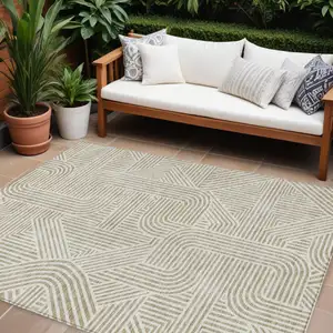 Photo of Beige And Brown Abstract Washable Indoor Outdoor Area Rug