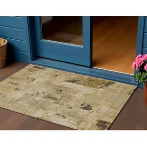 Photo of Beige And Brown Abstract Washable Indoor Outdoor Area Rug