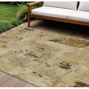 Photo of Beige And Brown Abstract Washable Indoor Outdoor Area Rug