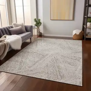 Photo of Beige And Brown Abstract Washable Indoor Outdoor Area Rug
