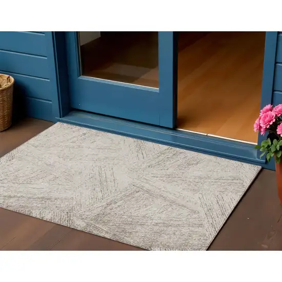 Beige And Brown Abstract Washable Indoor Outdoor Area Rug Photo 1
