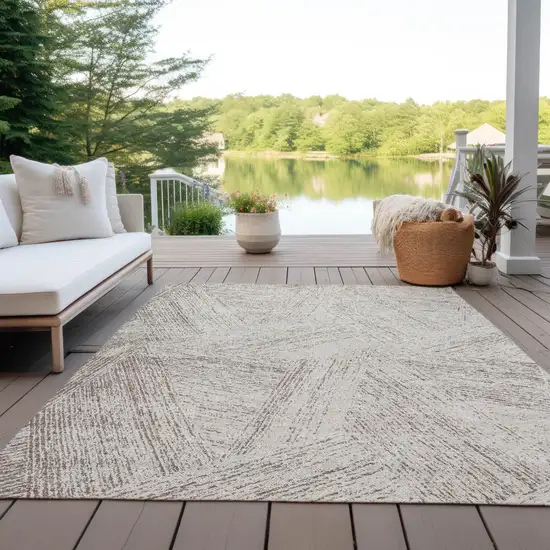 Beige And Brown Abstract Washable Indoor Outdoor Area Rug Photo 9