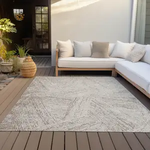 Photo of Beige And Brown Abstract Washable Indoor Outdoor Area Rug
