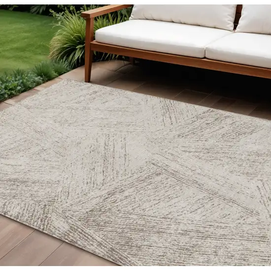 Beige And Brown Abstract Washable Indoor Outdoor Area Rug Photo 1
