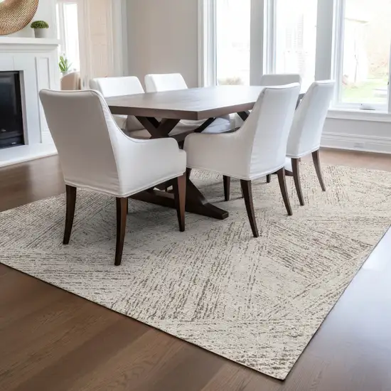 Beige And Brown Abstract Washable Indoor Outdoor Area Rug Photo 9