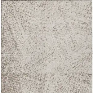 Photo of Beige And Brown Abstract Washable Indoor Outdoor Area Rug