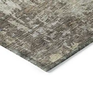 Photo of Beige And Brown Abstract Washable Indoor Outdoor Area Rug
