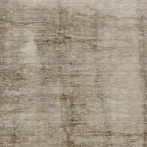 Photo of Beige And Brown Abstract Washable Indoor Outdoor Area Rug