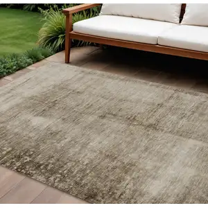 Photo of Beige And Brown Abstract Washable Indoor Outdoor Area Rug