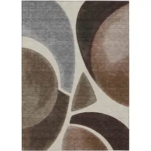Photo of Beige And Brown Abstract Washable Indoor Outdoor Area Rug