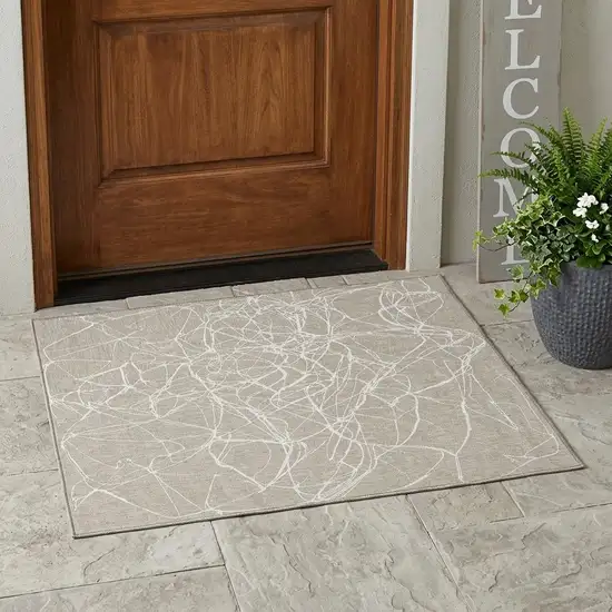 Beige And Brown Abstract Washable Indoor Outdoor Area Rug Photo 1