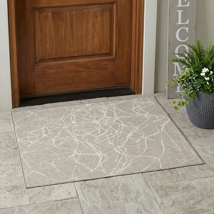 Beige And Brown Abstract Washable Indoor Outdoor Area Rug Photo 1