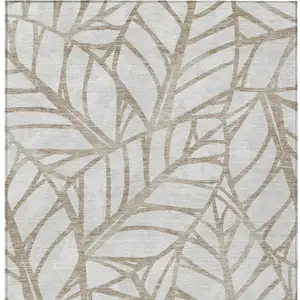 Photo of Beige And Brown Floral Washable Indoor Outdoor Area Rug