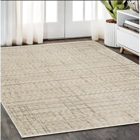 Beige And Brown Geometric Area Rug With Fringe Photo 1