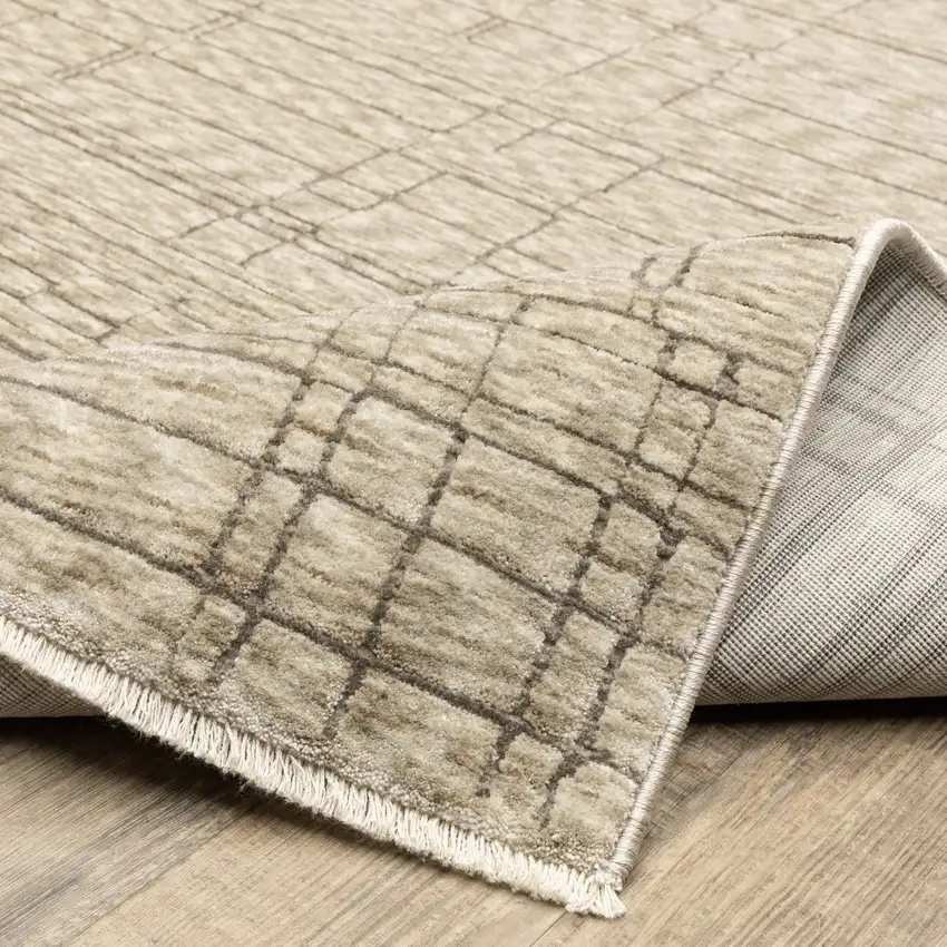 Beige And Brown Geometric Area Rug With Fringe Photo 9