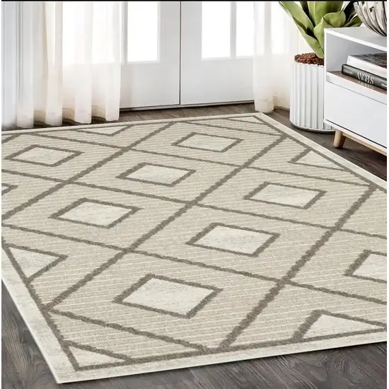 Beige And Brown Geometric Area Rug Photo 1