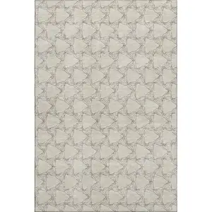 Photo of Beige And Brown Geometric Washable Area Rug With UV Protection