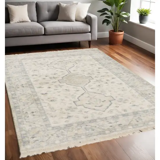 Beige And Charcoal Oriental Hand Loomed Stain Resistant Area Rug With Fringe Photo 1