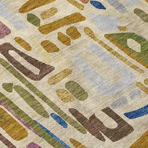 Photo of Beige And Copper Abstract Washable Indoor Outdoor Area Rug