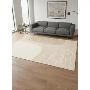 Photo of Beige And Cream Abstract Area Rug