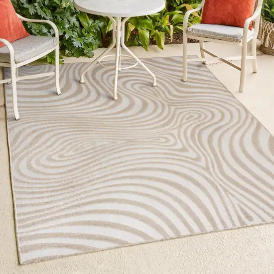 Beige And Cream Abstract Indoor Outdoor Area Rug Photo 9