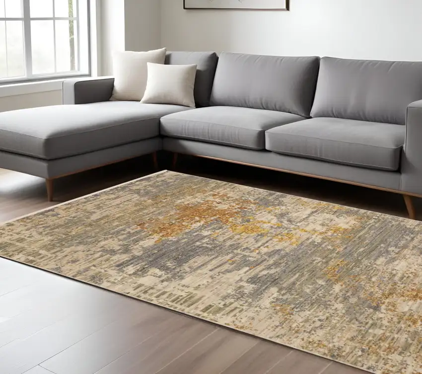 Beige And Gold Abstract Area Rug With Fringe Photo 1