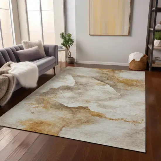 Beige And Gold Abstract Washable Indoor Outdoor Area Rug Photo 8