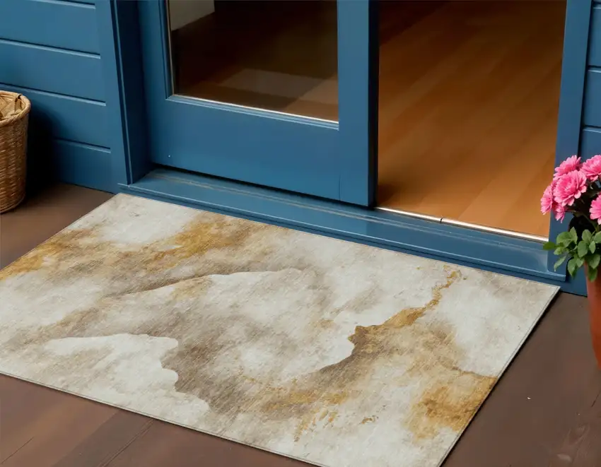 Beige And Gold Abstract Washable Indoor Outdoor Area Rug Photo 2