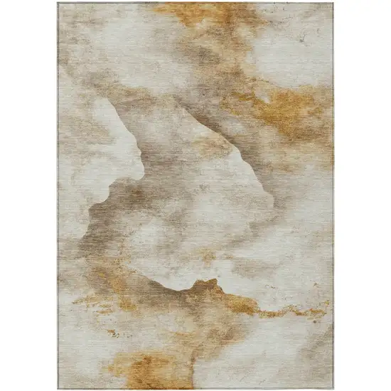 Beige And Gold Abstract Washable Indoor Outdoor Area Rug Photo 1