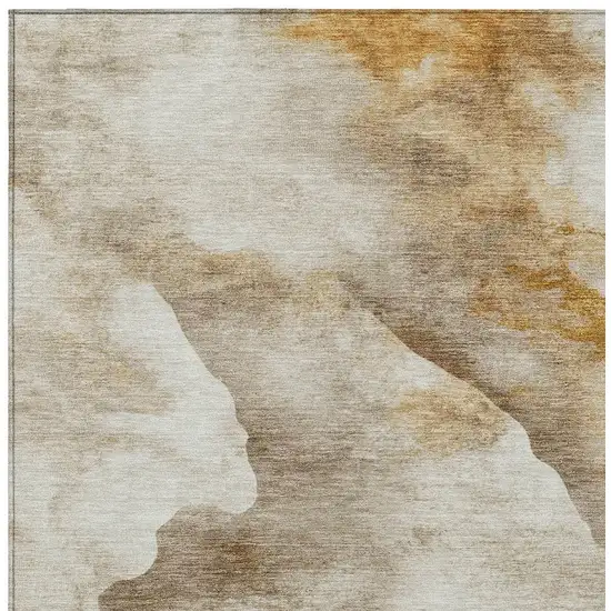 Beige And Gold Abstract Washable Indoor Outdoor Area Rug Photo 8