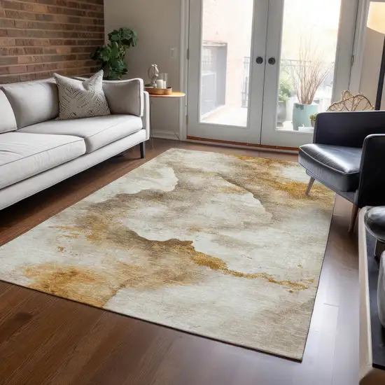 Beige And Gold Abstract Washable Indoor Outdoor Area Rug Photo 7