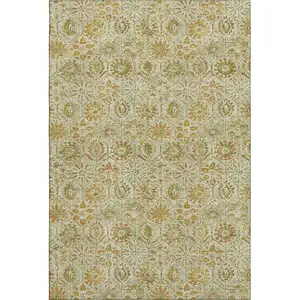 Photo of Beige And Gold Floral Washable Area Rug With UV Protection