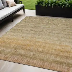 Photo of Beige And Gold Striped Washable Indoor Outdoor Area Rug