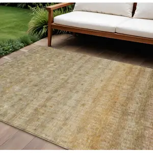 Photo of Beige And Gold Striped Washable Indoor Outdoor Area Rug