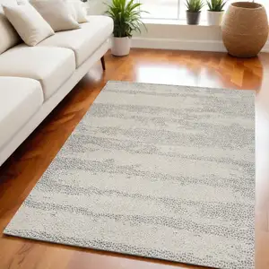 Photo of Beige And Gray Abstract Area Rug