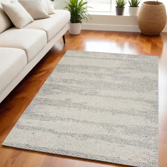 Beige And Gray Abstract Area Rug Photo 1