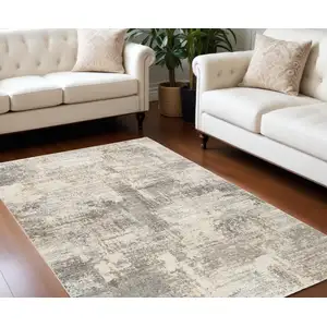 Photo of Beige And Gray Abstract Area Rug