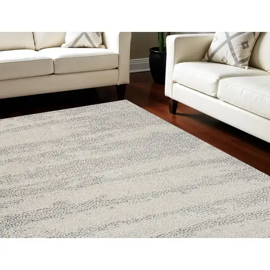 Beige And Gray Abstract Area Rug Photo 1